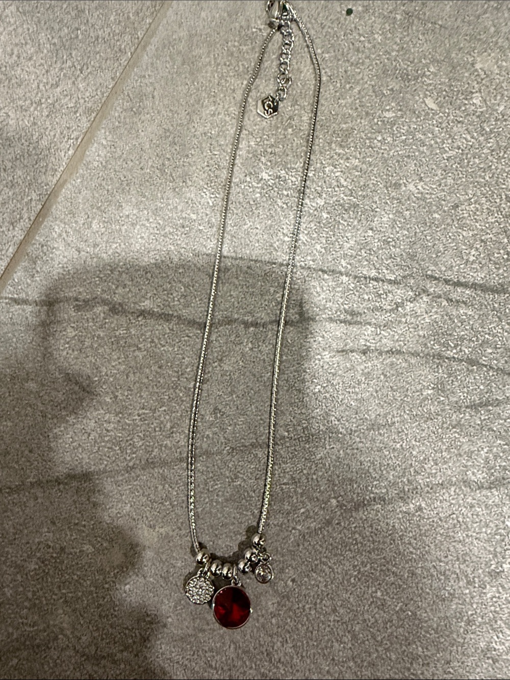 Touchstone Crystal Silver Necklace with Deep Red Crystal Charm